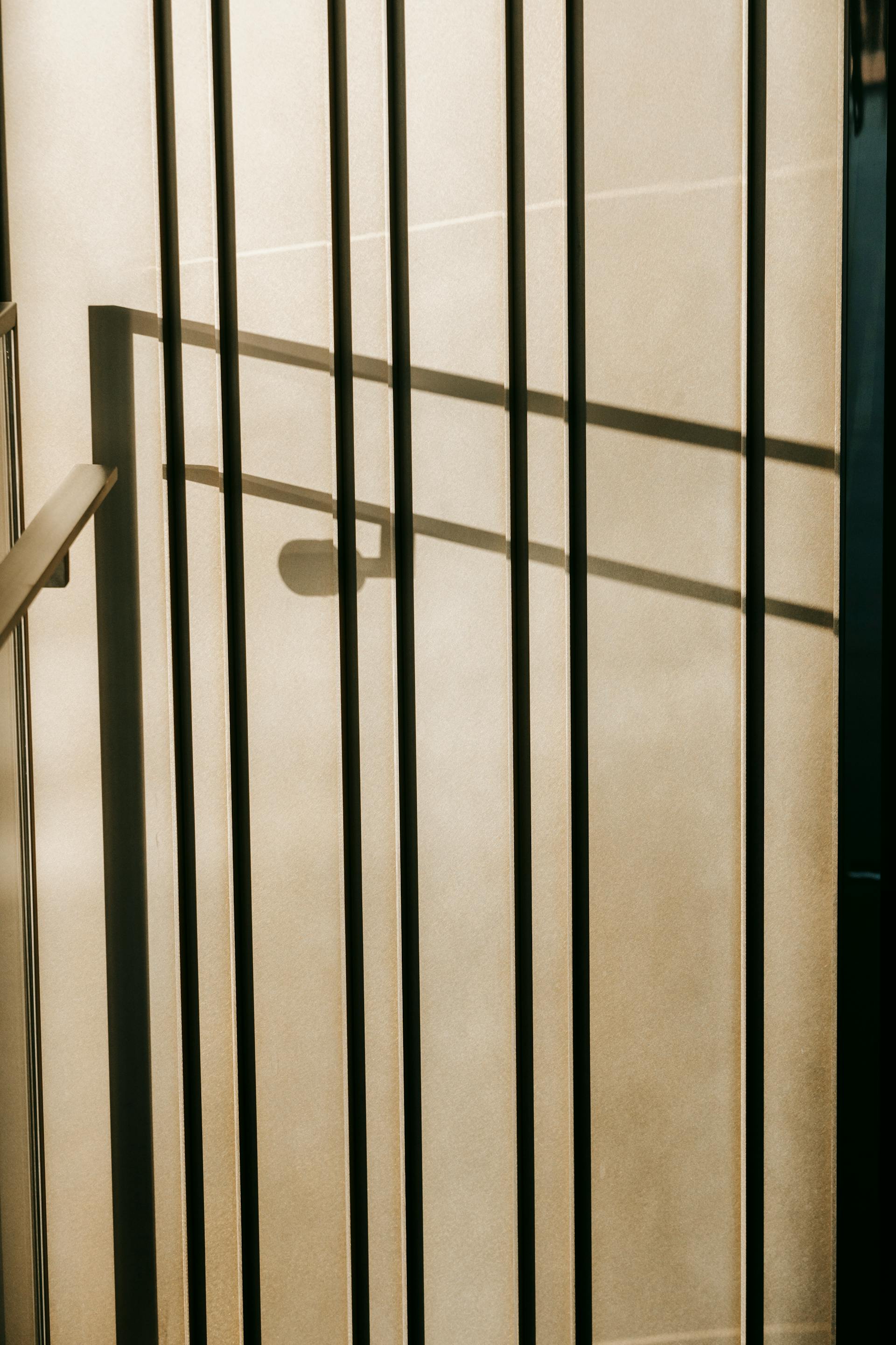 Spindeltreppe aus Stahl mit Holzstufen